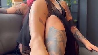 Aroused Woman With Tattoos Displaying Her Physique