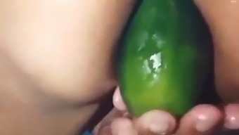 Stepmom Flaunts Her Open Ass By Using A Giant Cucumber