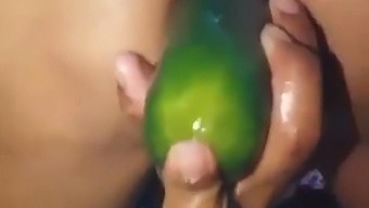 Stepmom Flaunts Her Open Ass By Using A Giant Cucumber