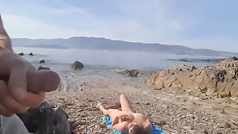 A Daring Exhibitionist Pleases A Nudist Milf On The Beach With His Impressive Manhood.